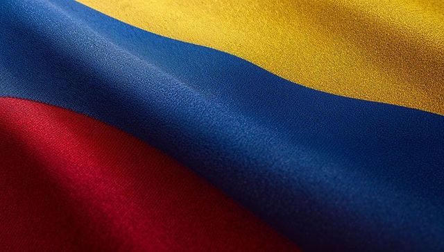 Colombia flag fabric waving textured tricolor yellow blue red macro studio lighting