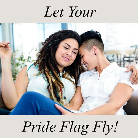 Diverse lesbian couple embracing happy in bright living room