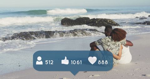 Couple Embracing on Beach with Social Media Icons Overlay