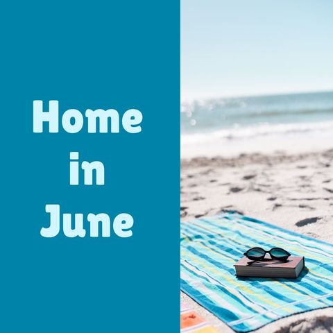 Beach Vacation Concept with Sunglasses and Book on Towel