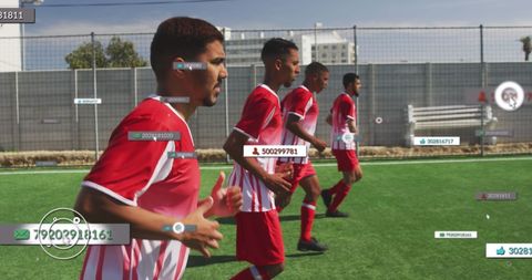 Football Players and Digital Social Media Interface on Field