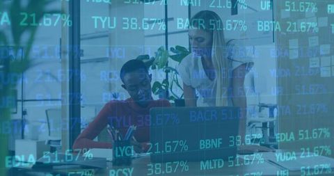 Women Collaborating in Modern Office with Financial Data Overlay