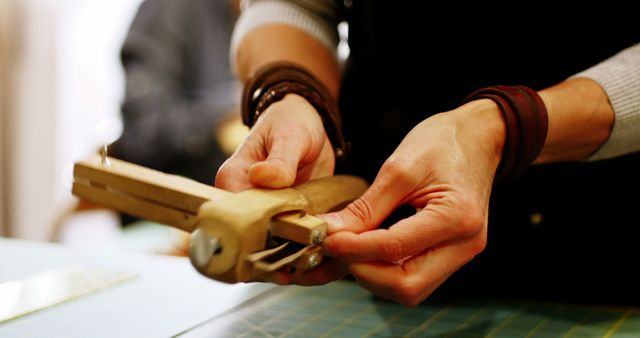 Closeup of Artisan Crafting Wooden Toy with Hand Tools - Download Free Stock Images Pikwizard.com