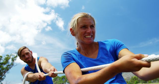 Determined Team Pulling Rope in Outdoor Tug of War - Download Free Stock Images Pikwizard.com