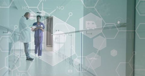 Doctors Discussing Patient Care in Futuristic Hospital Setting