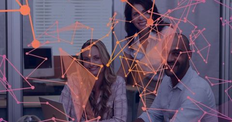 Collaborative team meeting with digital network overlay in office