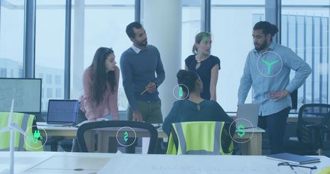 Diverse Architects Discussing Blueprint with Digital Overlay