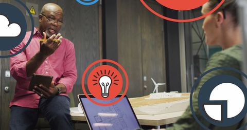Digital collaboration in modern office with creative icons