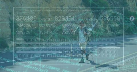 Mid adult hiker with trekking poles and digital overlay