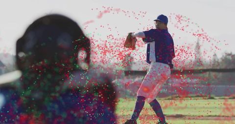 Dynamic pitcher on baseball field exploring technique