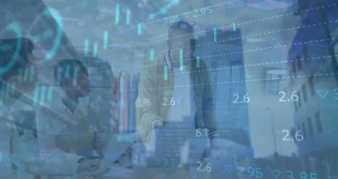 Business People Analyzing Financial Data in Office