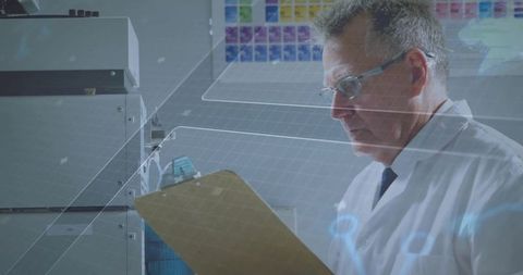 Senior scientist reviewing data in modern laboratory setting