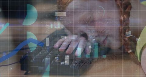 Redhead girl resting on keyboard with data graphics overlay