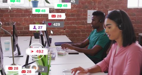 Diverse Team Analyzing Social Media Metrics in Modern Office