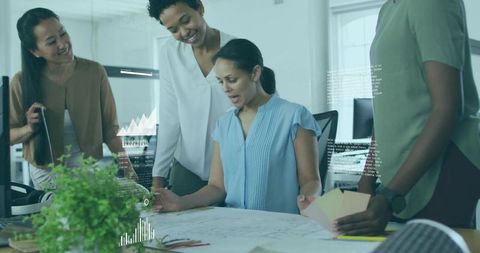 Architect Presenting Design Plans to Diverse Team in Modern Office Environment