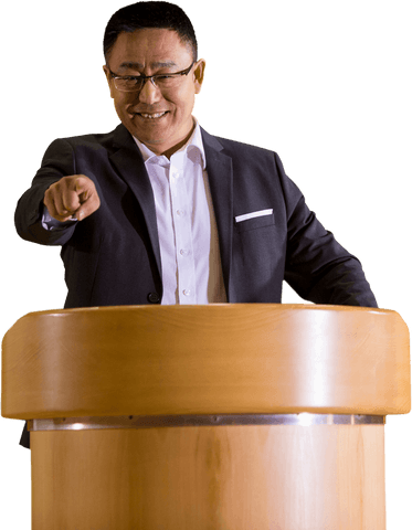 Confident businessman pointing from podium transparent background