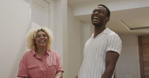 Smiling Couple Enjoying Quality Time at Home