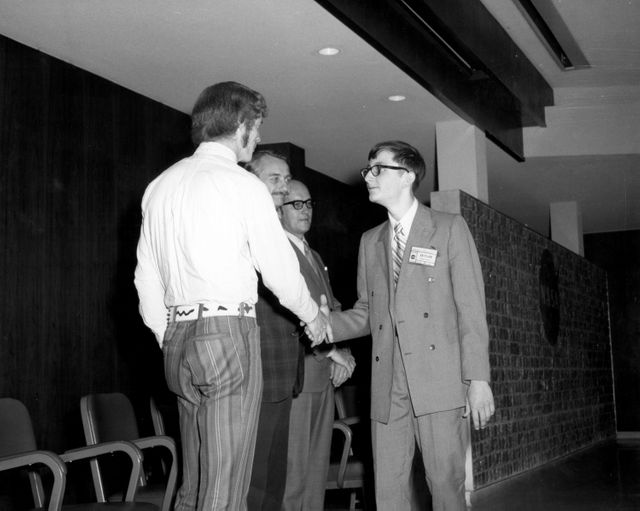 Youngstown, Ohio high school student, W. Brian Dunlap, is greeted by (left to right): Astronauts Russell L. Schweickart, and Owen K. Garriott; Marshall Space Flight Center (MSFC) Skylab Program Manager, Leland Belew; and MSFC Director of Administration and Technical Services, David Newby, during a tour of MSFC. Dunlap was among 25 winners of a contest in which some 3,500 high school students proposed experiments for the following year’s Skylab mission. The nationwide scientific competition was sponsored by the National Science Teachers Association and the National Aeronautics and Space Administration (NASA). The winning students, along with their parents and sponsor teachers, visited MSFC where they met with scientists and engineers, participated in design reviews for their experiments, and toured MSFC facilities. Of the 25 students, 6 did not see their experiments conducted on Skylab because the experiments were not compatible with Skylab hardware and timelines. Of the 19 remaining, 11 experiments required the manufacture of additional equipment. 