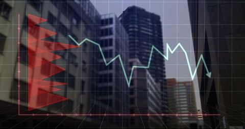 Financial charts and graphs over urban cityscape