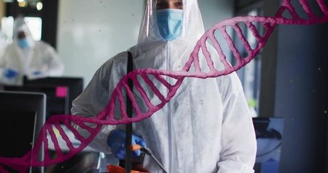 Decontamination Technician Wearing Full PPE Spraying Office with DNA Strand Overlay