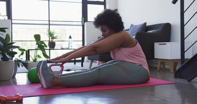 Woman Exercising in Contemporary Home Gym - Download Free Stock Images Pikwizard.com