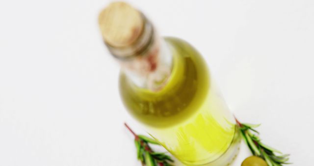 Bottle of Olive Oil with Fresh Rosemary on White Background - Download Free Stock Images Pikwizard.com