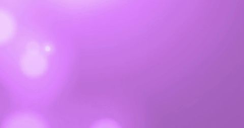 Abstract light spots on pastel purple background