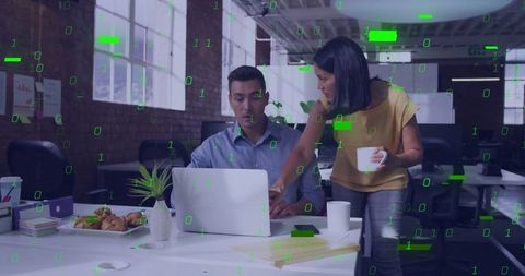 Colleagues Collaborating on Laptop in Modern Office with Tech Overlay