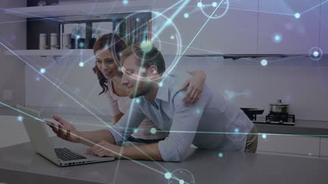 Couple Engaging with Advanced Digital Network Interface in Kitchen