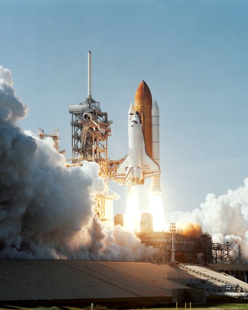 This image captures the Space Shuttle Atlantis lifting off from Launch Complex 39 at the Kennedy Space Center on April 8, 2002. It showcases the shuttle in the initial stage of its mission to the International Space Station (ISS). This vibrant and powerful image is ideal for use in educational materials, space exploration articles, aerospace engineering resources, and inspirational posters.