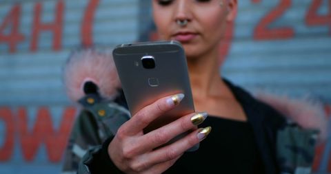 Young Woman Taking Selfie Outdoors with Smartphone - Download Free Stock Images Pikwizard.com