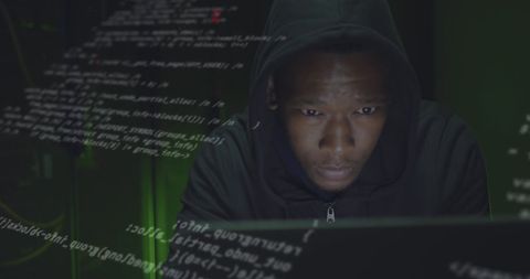 Hacker in Dark Room Working on Laptop with Data Code Overlay - Download Free Stock Images Pikwizard.com