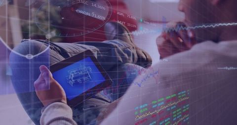 Man holding tablet studying blueprint with fintech analytics and stock market overlays