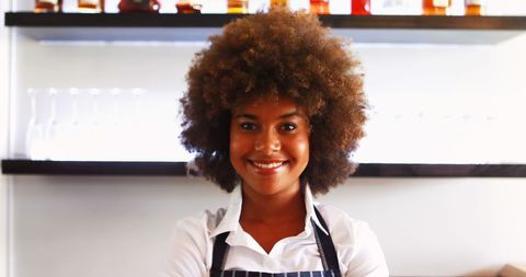 Confident Waitress Smiling in Upscale Restaurant Setting - Download Free Stock Images Pikwizard.com