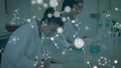 Diverse Scientists Analyzing Data in High-Tech Laboratory