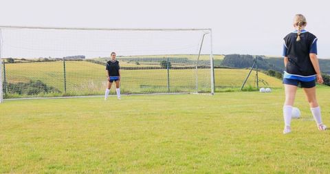 Teenage Soccer Team Practicing Skills on Outdoor Field