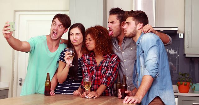 Friends Making Funny Faces for a Kitchen Selfie - Download Free Stock Images Pikwizard.com