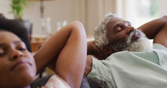 Peaceful African American Couple Relaxing on Sofa at Home - Download Free Stock Images Pikwizard.com