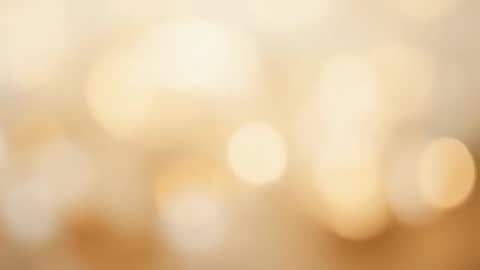 Pulsing Golden Bokeh Loop Drifting Warm Ambient Glow for Background Video