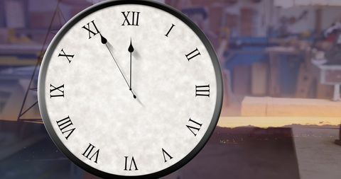 Large Wall Clock Striking Midnight in Modern Office - Download Free Stock Images Pikwizard.com