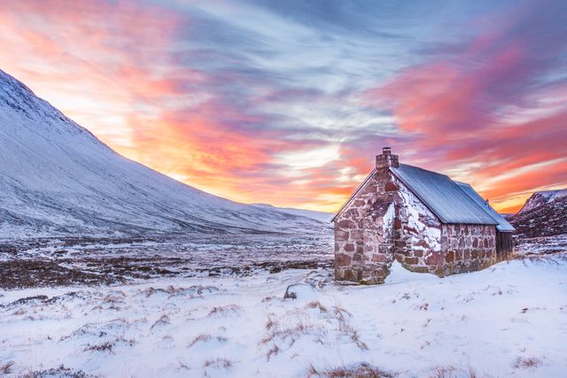 Solitary Stone Cabin in Snowy Mountain Landscape at Sunset - Download Free Stock Photos Pikwizard.com