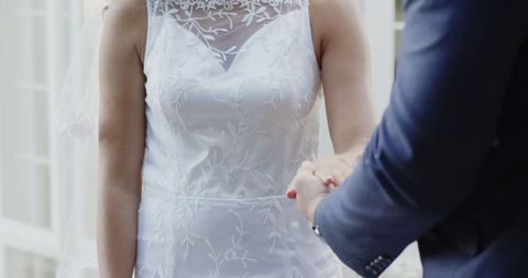 bride and groom holding hands in beautiful wedding ceremony - Download Free Stock Images Pikwizard.com
