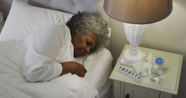 Senior African American Woman Sleeping Peacefully in Bed - Download Free Stock Images Pikwizard.com