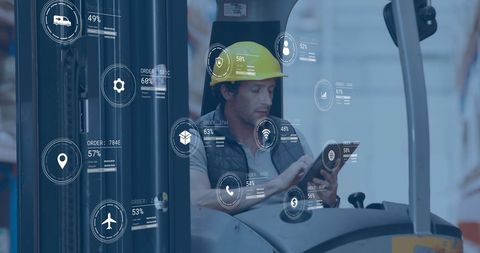 Warehouse Worker Using Tablet with Digital Icons Overlay