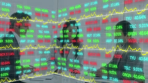 Business Team Analyzing Stock Market Data in Office Meeting