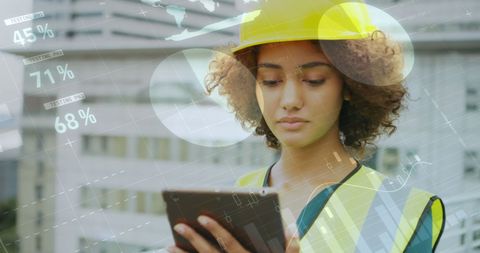 Architect Analyzing Data on Tablet with Construction Overlay Background - Download Free Stock Images Pikwizard.com