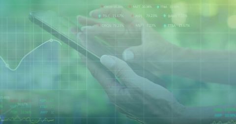 Businesswoman Analyzing Digital Financial Data on Mobile Device