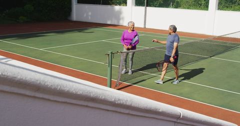 Happy Senior Couple Enjoying Tennis Together Outdoors - Download Free Stock Images Pikwizard.com