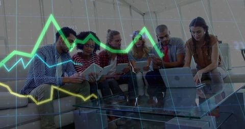 Tech Savvy Team Collaborating in Modern Office Lounge