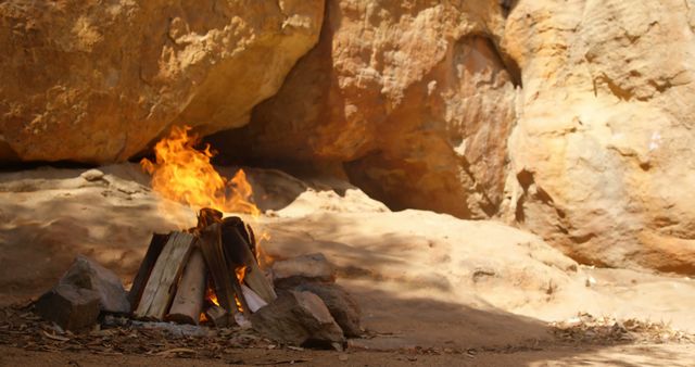 Campfire Burning in Rocky Desert Environment - Download Free Stock Images Pikwizard.com